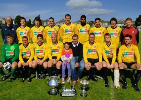 Ovenden West Riding proudly show off the three trophies they have won this season