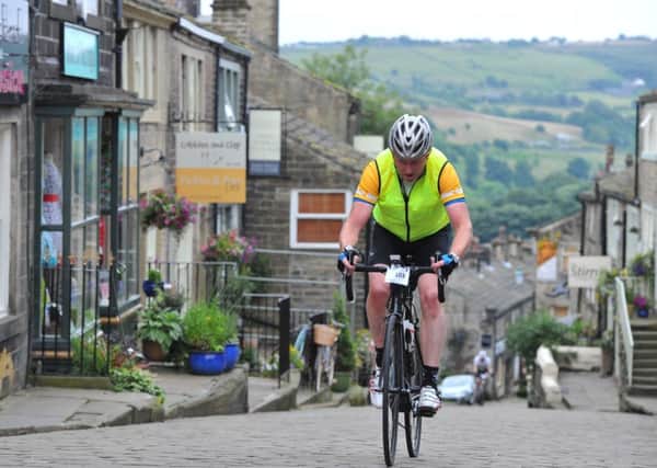 Mark Mageean cycled to the top of the cobbled climb of Haworth High Street