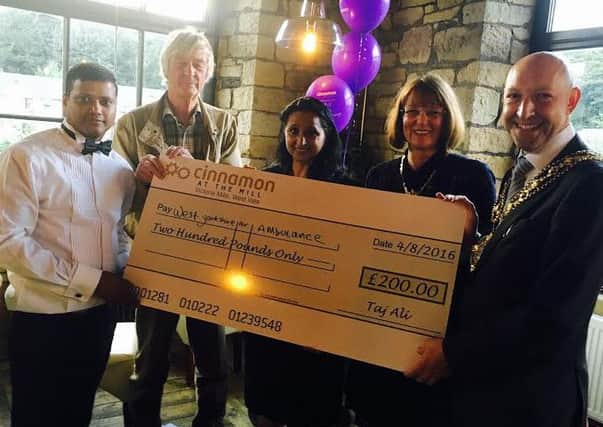 Cheque presentation to the Yorkshire Air Ambulance at the Cinnamon at the Mill restaurant