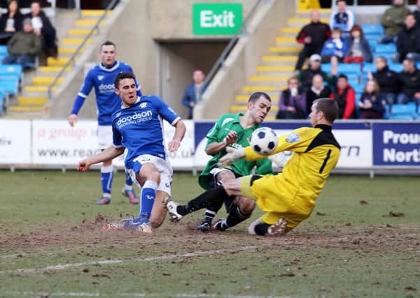 Lee Gregory scoring one of his four goals for Halifax against Worcester in 2013.