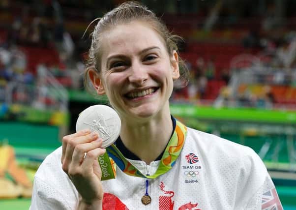 Bryony Page celebrates with her Olympic silver medal