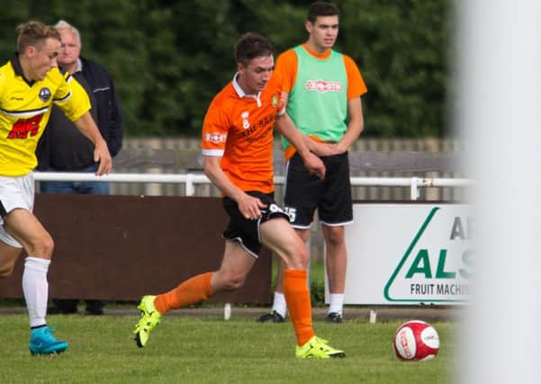 Actions from Brighouse Town v Atherton, FA Cup football at St Giles Road. Pictured is Tom Haigh