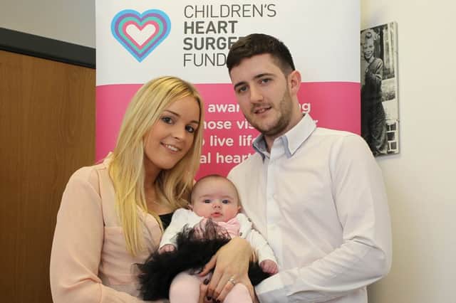 Nick and Charlotte Ford with their daughter Amelia fund raising for the Children's Heart Surgery Fund.