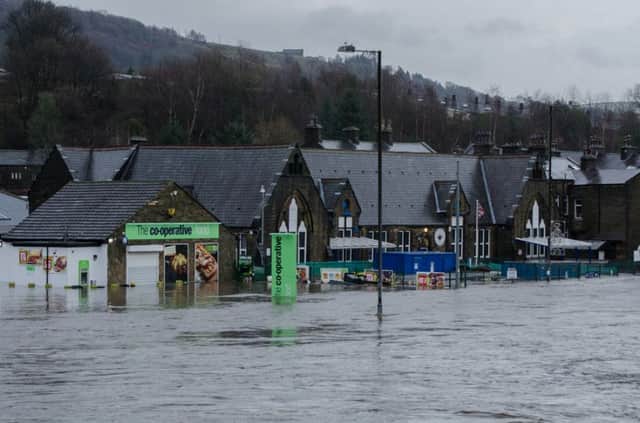 The Co-op and Burnley Road, Mytholmroyd, December 26, 2015, floods. Picture by  Jade Smith