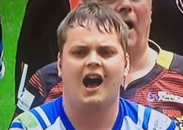 Halifax RLFC fan Richard Farrell performing as part of a BBC Songs of Praise competition choir at the 2016 Rubgy League Challenge Cup Final at Wembley.