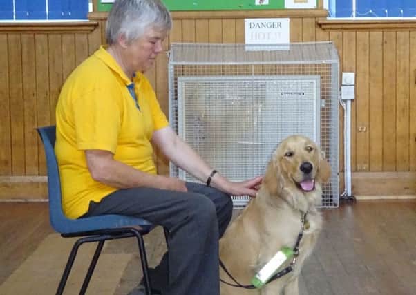 Jackie with new recruit Demi at one of Guide Dog's monthly puppy training classes