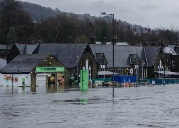 The Co-op and Burnley Road, Mytholmroyd, December 26, 2015, floods. Picture by Jade Smith