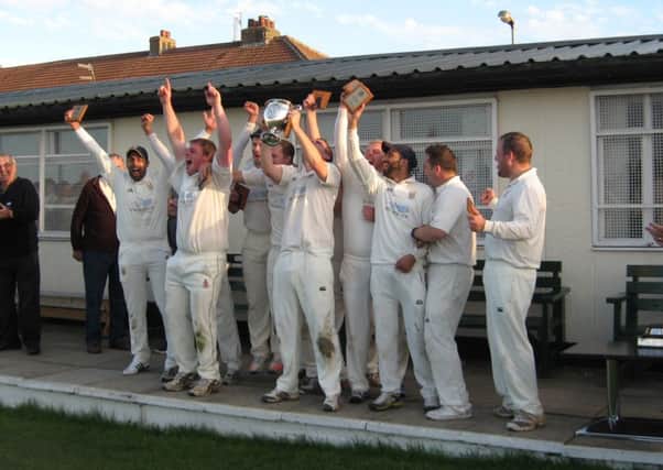 Booth celebrate their 2016 Halifax League title success after victory at Jer Lane
