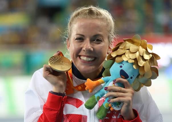 Hannah Cockroft scoops gold in the 2016 Rio Paralympics. 
This image is copyright onEdition 2016Â©.