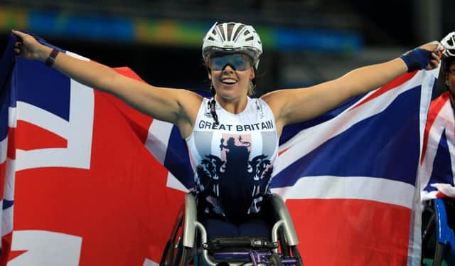 Great Britain's Hannah Cockroft celebrates winning the Women's 400 metres T34 final at the Olympic Stadium during the seventh day of the 2016 Rio Paralympic Games in Rio de Janeiro, Brazil. PA