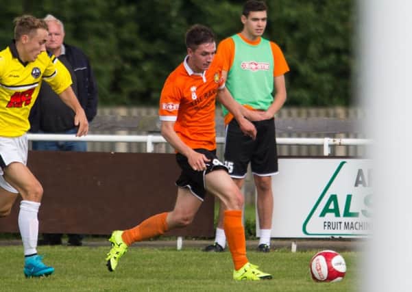 Actions from Brighouse Town v Atherton, FA Cup football at St Giles Road. Pictured is Tom Haigh
