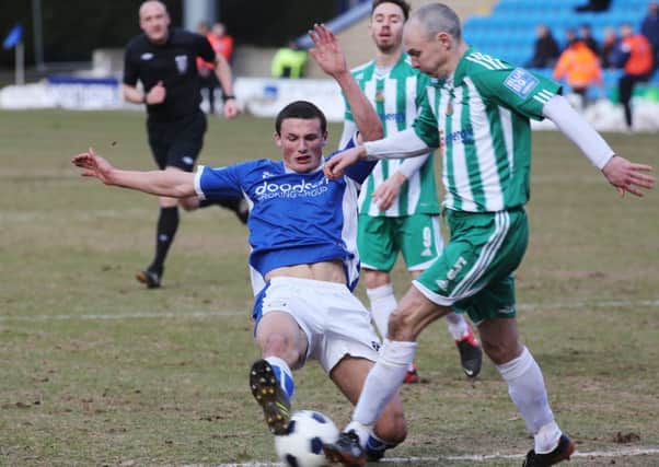 Matty Pearson in action for FC Halifax Town in their last meeting with Bradford Park Avenue at The Shay in 2013.