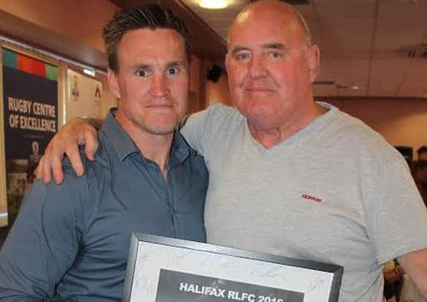 Players Association Chairman Ken Roberts, Heritage Number 732, with current coach Richard Marshall, Heritage Number 1077