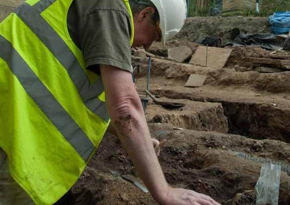 Archaeologist from WYAS working on Square Chapel site.