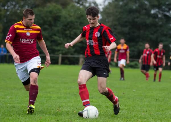Actions from Warley Rangers v Illingworth SM, at Shroggs Park. Pictured is Jonny Lamb and Luke Prosser