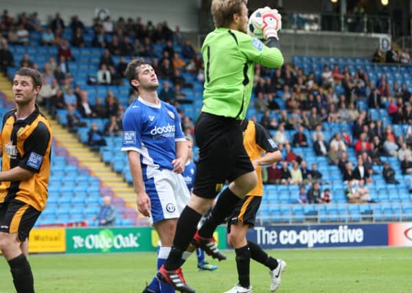 Dale Johnson in action for Halifax Town v Gloucester City at The Shay in 2012