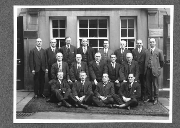Managers and foremen at Standeven and Co on October 15, 1926 (top) and below, office staff at the firm