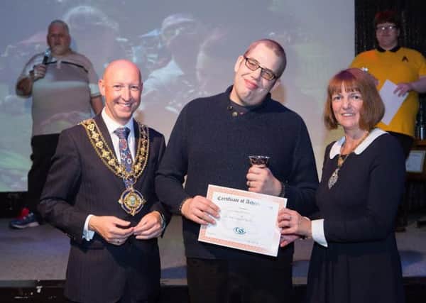 The Mayor and Mayoress of Halifax presenting Sam Bottomley with the Peoples Champion Award 2016