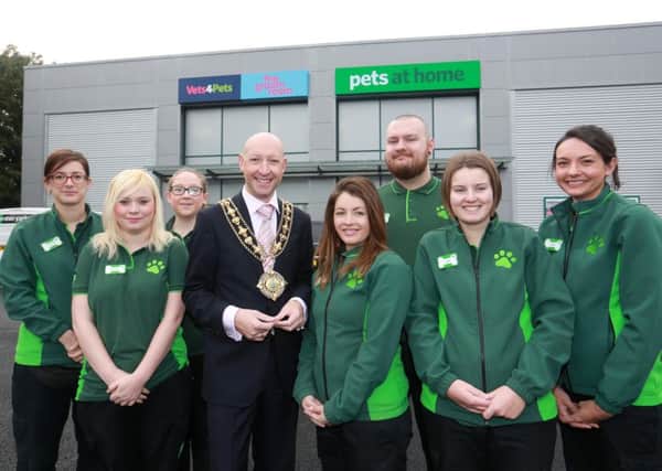 Pets at Home Brighouse Store Manager Natalie Mason and staff members Charlotte Thompson, David Lamonby, Katie Lees, Shannon Barrowcliffe, Megan Dugdale, Ellie Shanley, Charline Saint-Georges and Laura Pearson with The Mayor of Calderdale Cllr Howard Blagbrough outside the new store. 

credit:  leeboswellphotography.com