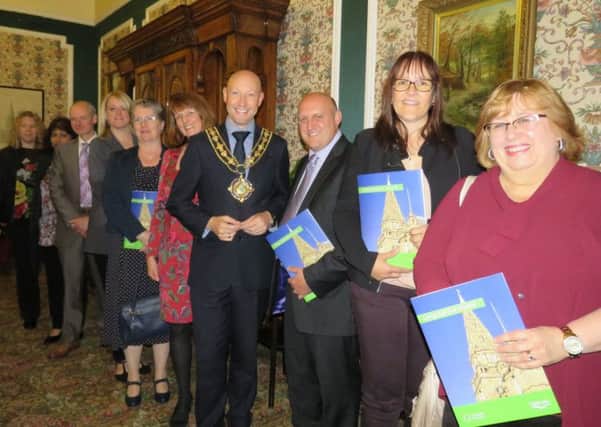 Staff receiving their Long Service Awards from the Mayor of Calderdale, Cllr Howard Blagbrough and the Mayoress, Mrs Catherine Kirk.