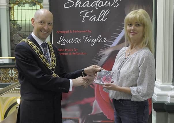 Calderdale Mayor Howard Blagbrough (left), with Louise Taylor