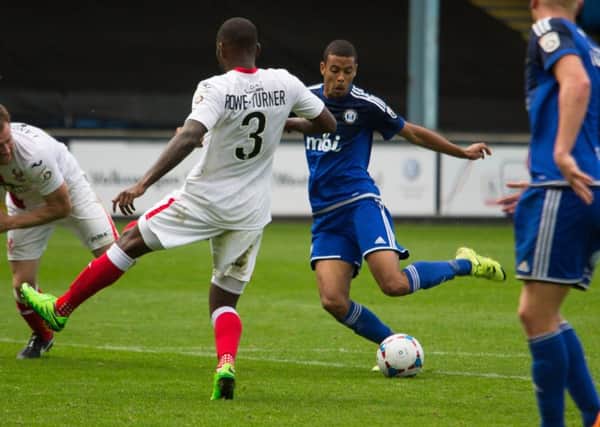 CJ Hamilton in action for Halifax Town v Kidderminster Harriers at The Shay last season. Both clubs went on to be relegated at the end of the campaign.
