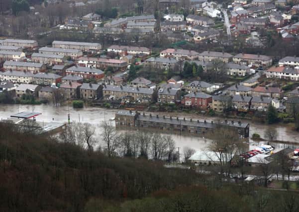 Mytholmroyd centre under water after the River Calder burst its banks.