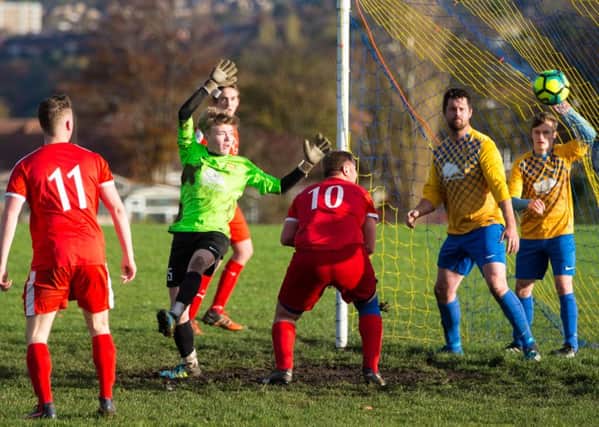 Actions from Greetland v Hebden Royd RS, at Greetland Goldfields. Pictured is James Rawlinson scores for Red Star