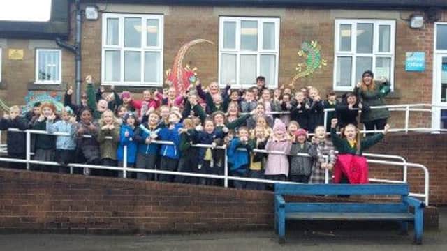 Children, staff and parents at at St Malachys Catholic Primary School completed a sponsored walk to raise money for Aaron Lindsey