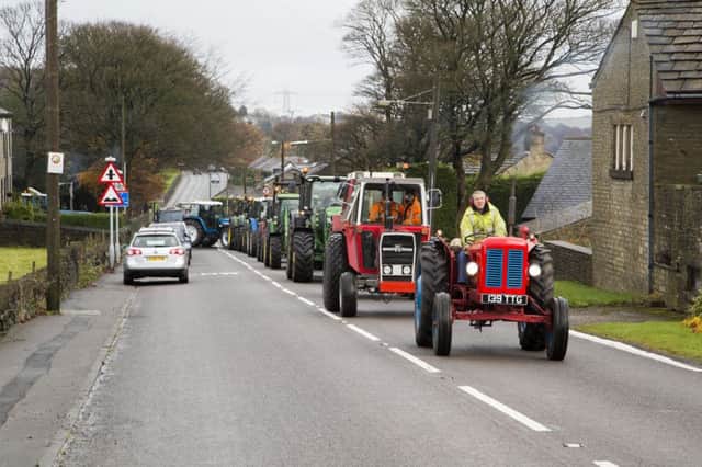 Harry's Tractor Run in memory of Harry Perry sets off from Barkisland.