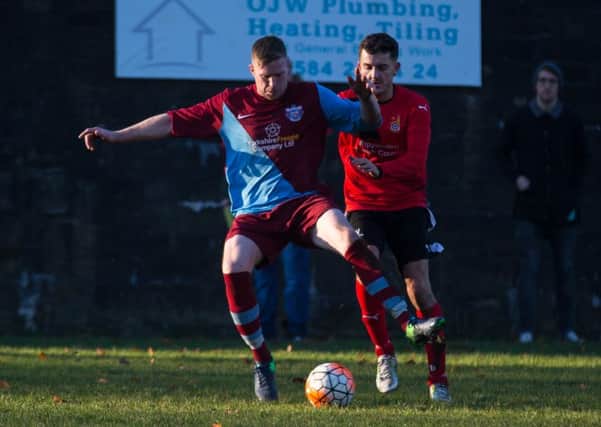 Ryburn Utd v Sowerby Bridge in cup match, Wood Bottom, Ripponden. Pictured are Jamie Jepson and Oliver Brearley
