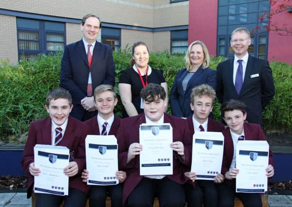 Runners-up in the Emmanuel Schools Foundation Business Game, Team Illumination, from Trinity Academy, Thorne, (front row L-R) Sam Middleton, Luke Keeble, Sonny Gutteridge, Taylor Gray and Oliver Clark with (back row L-R) judges John Inglis-Jones, Ruth Watson and Debbie Schofield, and David Dawes, principal of host The Kings Academy