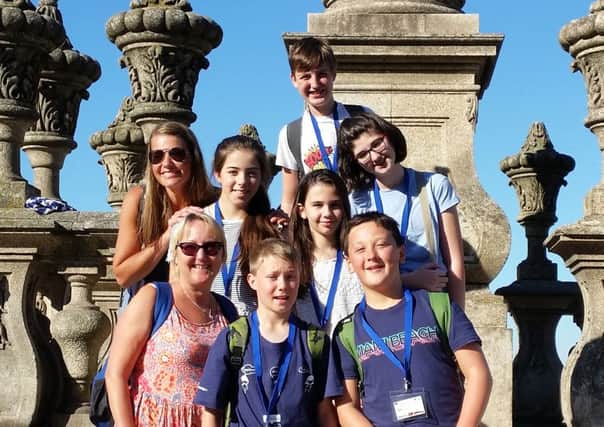 (L-R) Noah Butterfield, Mrs Clements, Ella Whiteside-Smith, Leila Lang, Jessica White, Mrs Fahey, Ben Welch and Tom Leung in Porto