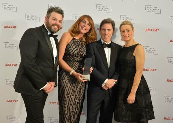 Staff from Catch Seafood wuth awards host Rob Brydon