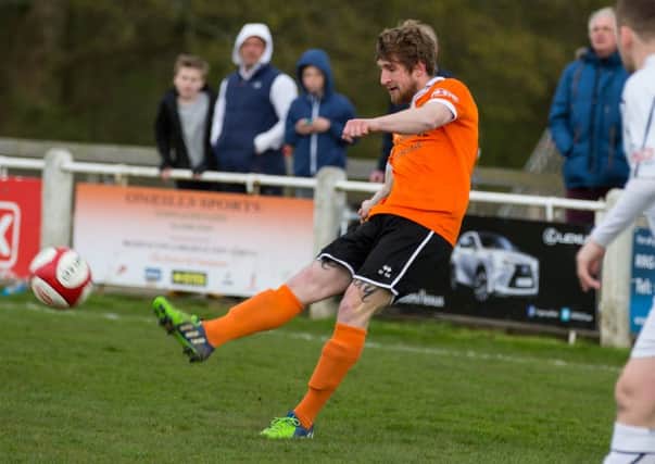 Actions from Brighouse Town v Mossley. Pictured is Tom Robinson