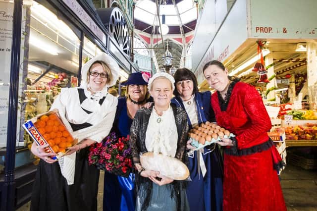 Dressed in Victorian outfits at Calderdale Borough Market, Halifax, from the left, Lynne Bray, Sheryden Clegg, Paula Samples, Eileen Billington and Joanna Gerrard.