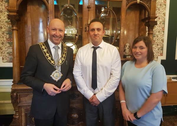 Mayor of Calderdale Coun Howard Blagbrough with Ben Moorhouse and Gaynor Thompson