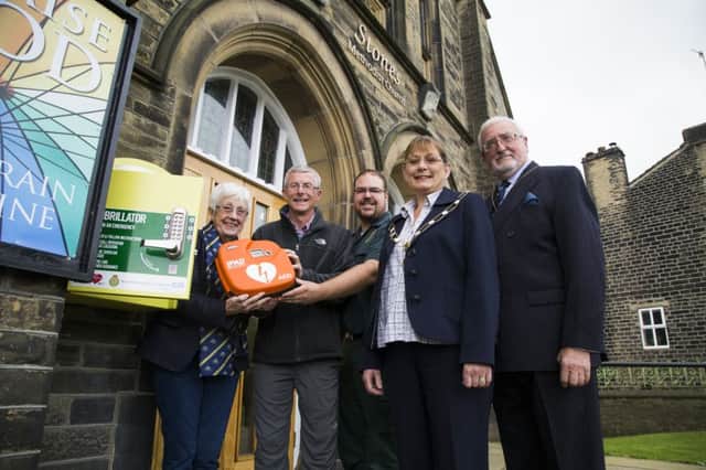 Defibrillator installed at Stones Methodist Church, Ripponden. From the Left, Hazel Brindle from the Rotary Club of Sowerby Bridge, Andrew Smith from the church, John Spikings from Yorkshire Ambulance Service, councillor Jayne Smith from Ripponden Parish Council and councillor Melvyn Smith JP from Ripponden Parish Council.