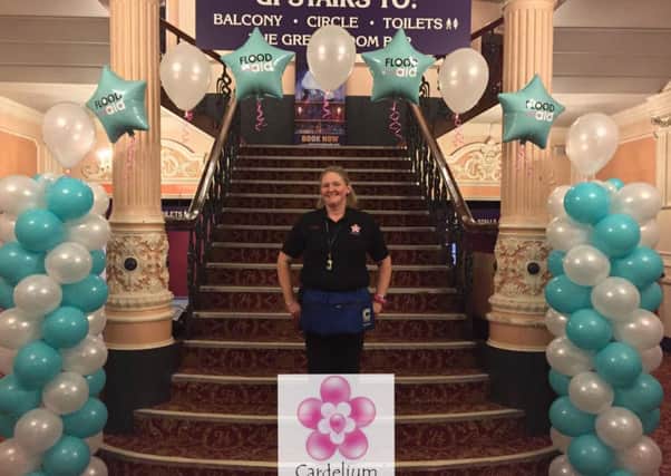 Director of Cardelium Ltd, Anthea Orchard with the balloons donated for the Yorkshire Flood Aid Concert at the Victoria Theatre.