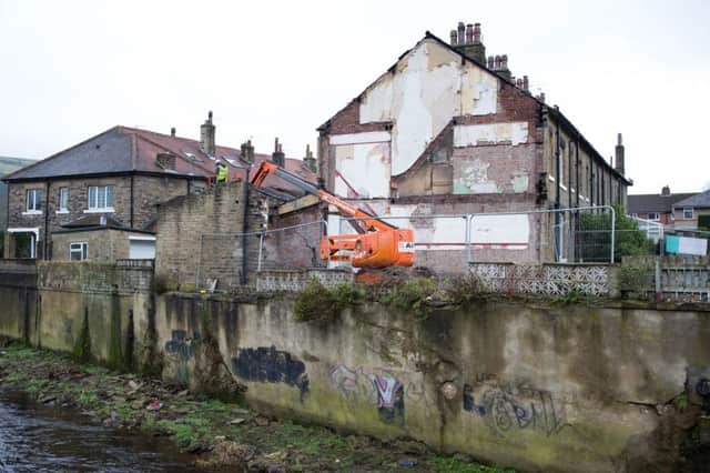 House being demolished, by the Calder River, Mytholmroyd