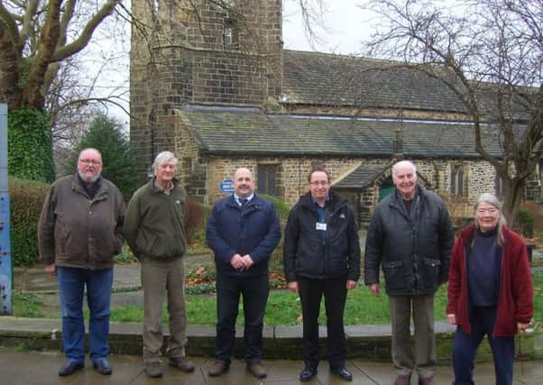 Brian Mansfield, Coun John Ford, David Wilkinson, Graham Gibbons, Joe Braithwaite and Vicky Wilkinson, outside the 12th Century St Mary's Church.