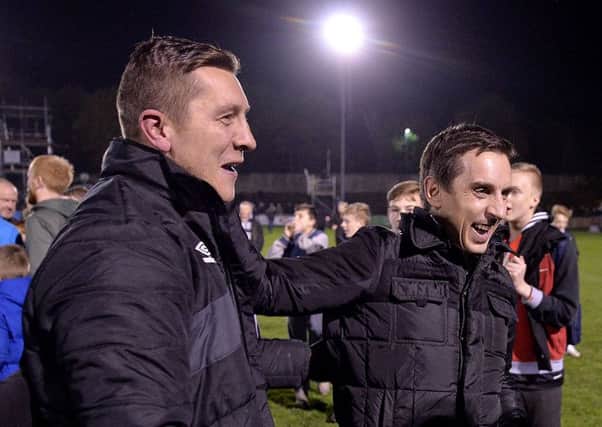 Salford City's co-manager Anthony Johnson and co-owner Gary Neville