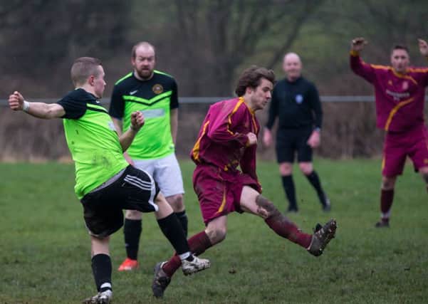 Actions from Top Club v Feathers football, at Carr Green.