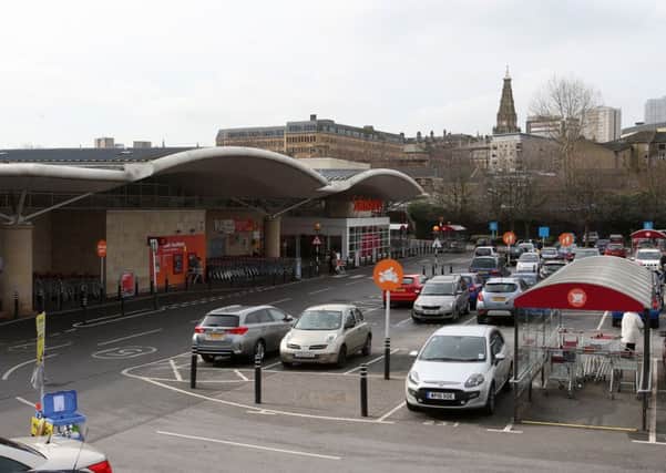 Plans for new signs and more for Sainsbury, Halifax.