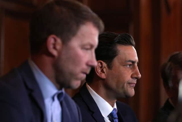 Steve Walters (left) and Andy Woodward at the launch of the Offside Trust at the Midland Hotel in Manchester. Pic: PA