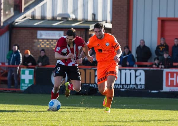 Matty Brown in action at Altrincham. Photo: Michael Ripley