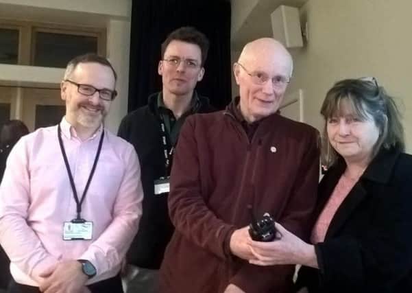 A new radio being handed over to a flood warden. Left to right: John Beacroft-Mitchell, Neighbourhood Co-ordinator (Flood Recovery) at Calderdale Council; Graham Lindsey, Flood Resilience Advisor at the Environment Agency; Andrew Entwistle, Flood Warden; Coun Susan Press, Calderdale Councils Cabinet Member for Neighbourhoods and Communities.
