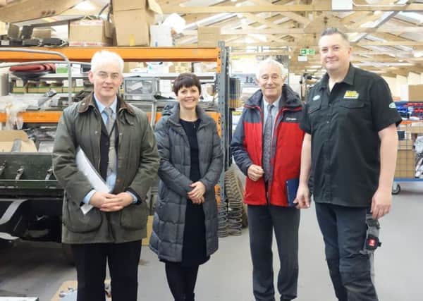 Duncan Cooper, of Calderdale Council; landlord Heidi Bingham, Councillor Barry Collins and Kevin Baldwin from MUD UK.