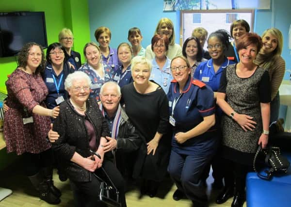 Hospital colleagues with Chris Chittell and Lesley Dunlop teenage room