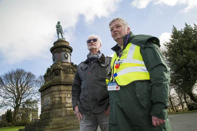 Councillor Ashley Evans, left, and Ian Hay from the Friends of West View Park, trying to get the war memorial repaired, West View Park, Highroad Well.